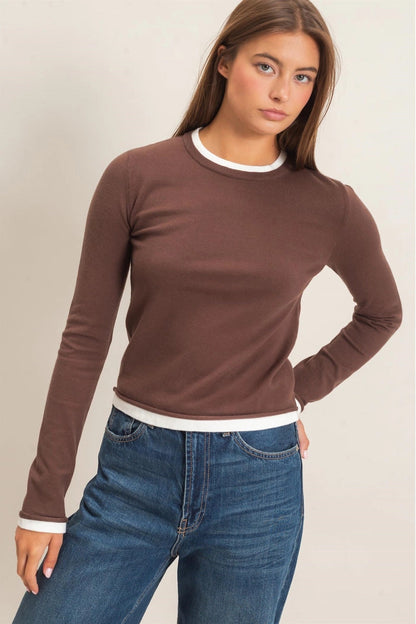 woman wearing brown shirt with jeans 