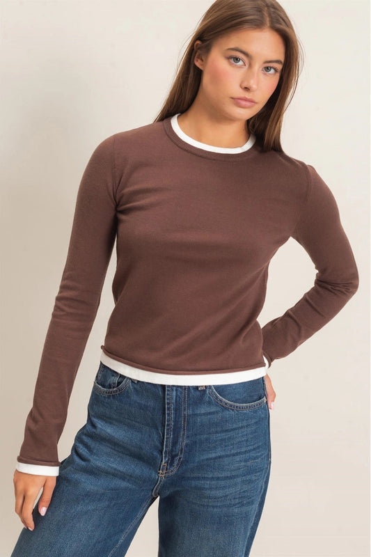 woman wearing brown shirt with jeans 