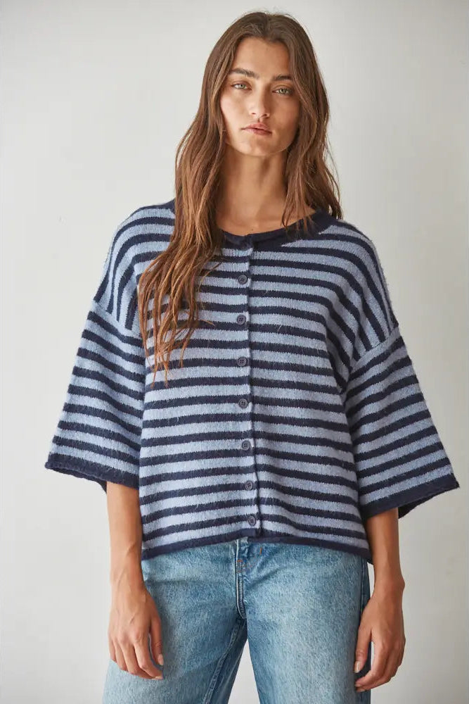 woman in blue striped sweater