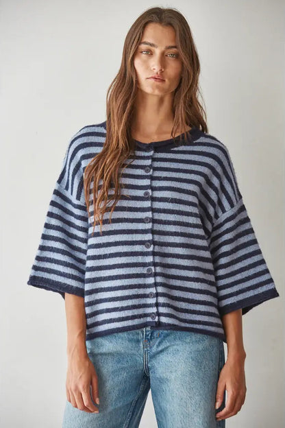 woman in blue striped sweater