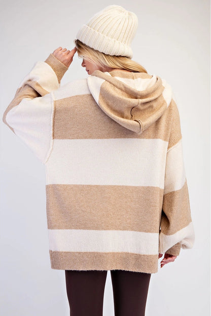 woman in striped hooded sweater