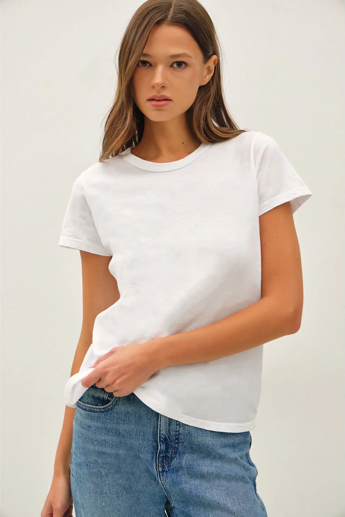 woman in tee and jeans