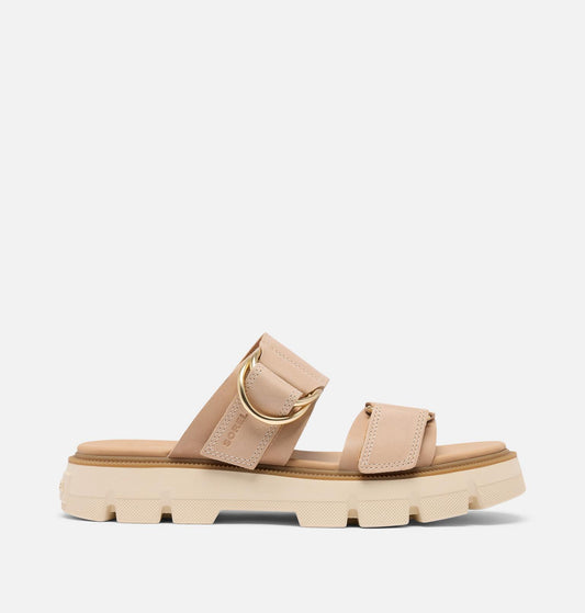 Beige sandal with a thick sole on a light gray background