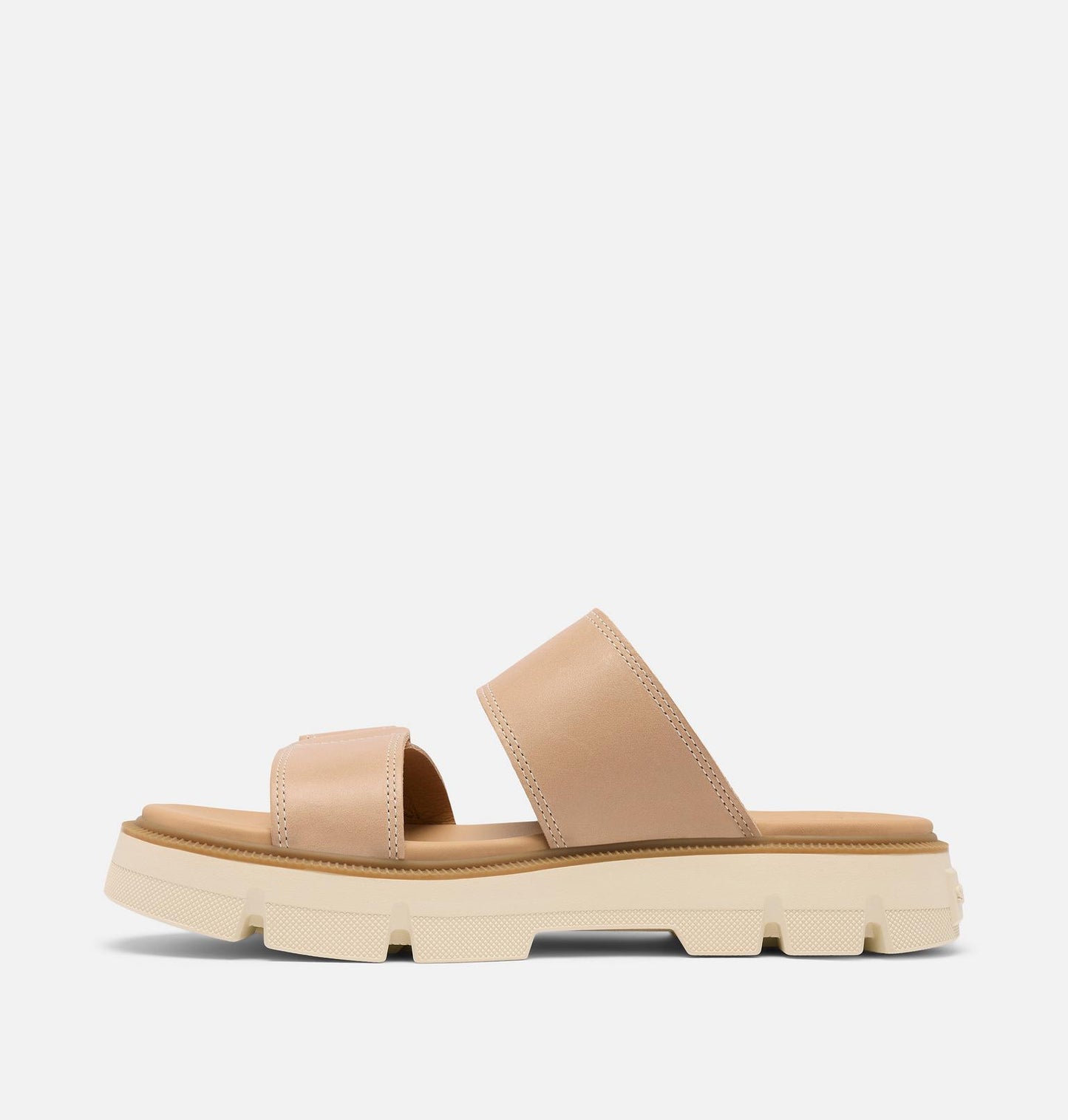 Beige sandal with a thick sole on a light gray background