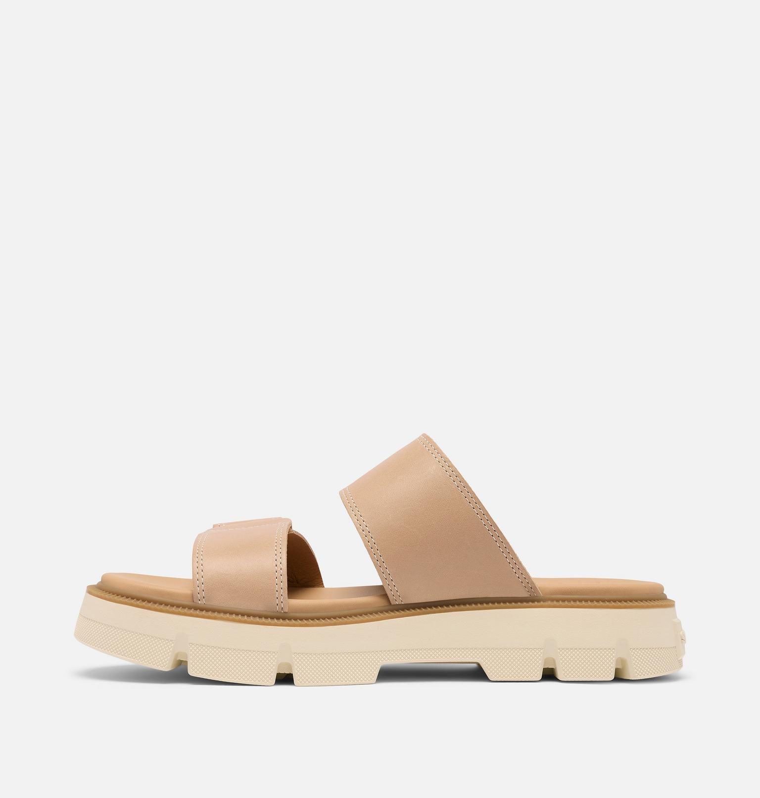 Beige sandal with a thick sole on a light gray background