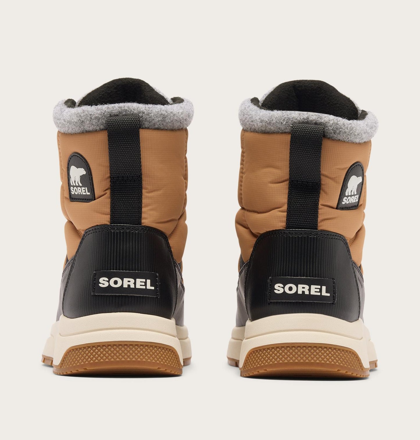 Pair of Sorel winter boots on a white background
