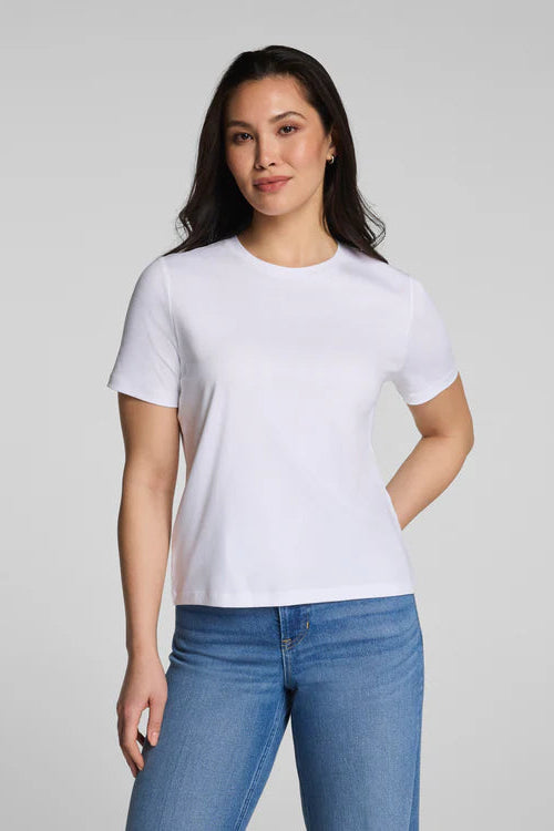 woman wearing white tee with jeans 