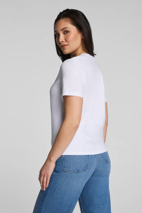woman wearing white tee with jeans 