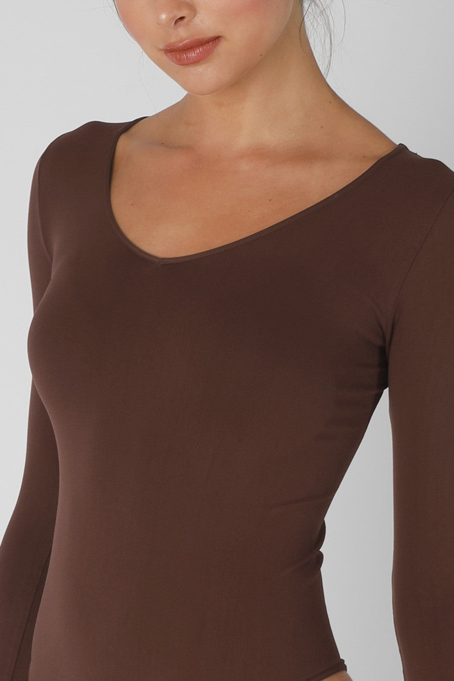close up of v neck bodysuit