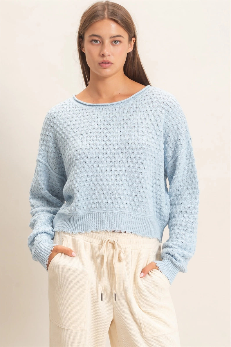 woman wearing blue sweater