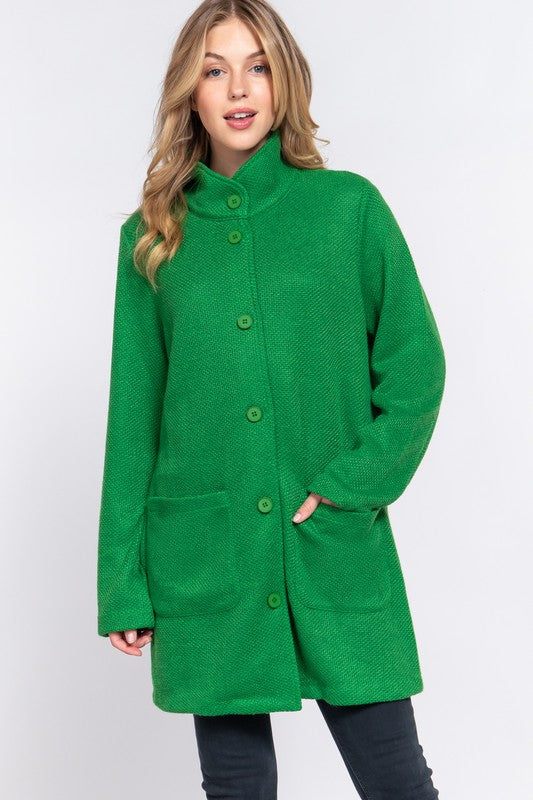 woman in green coat