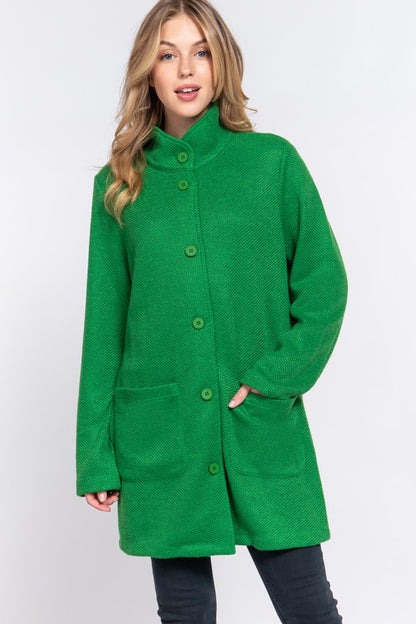 woman in green coat