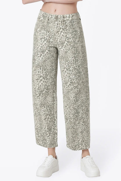 close up of person wearing leopard jeans