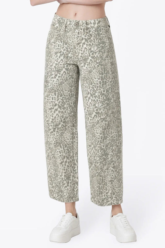 close up of person wearing leopard jeans