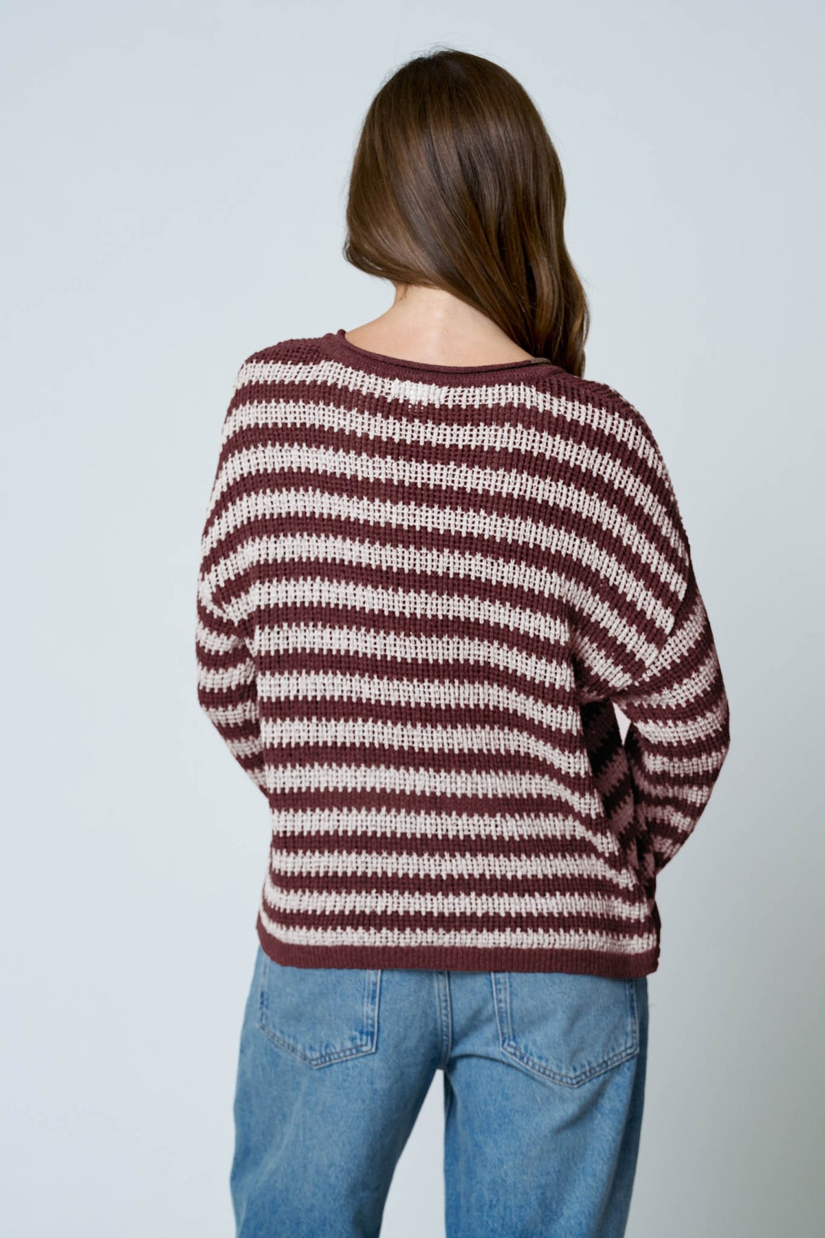 woman wearing stripe sweater