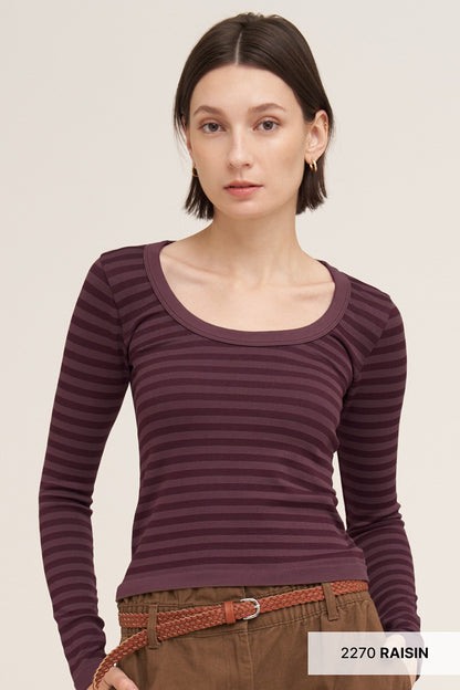 woman in striped long sleeve top 