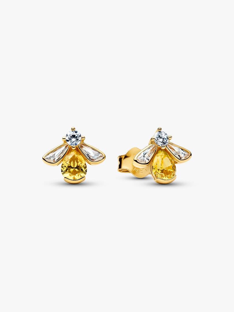 Gold bee-shaped earrings with clear gemstones on a white background