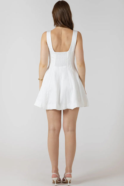 woman wearing white mini dress
