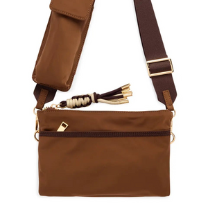 A brown nylon crossbody bag with a matching brown leather pouch and a wide adjustable shoulder strap, featuring gold-tone metal hardware and a tassel detail, shown against a plain white background.