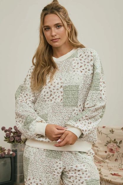 woman in quilted top and bottom