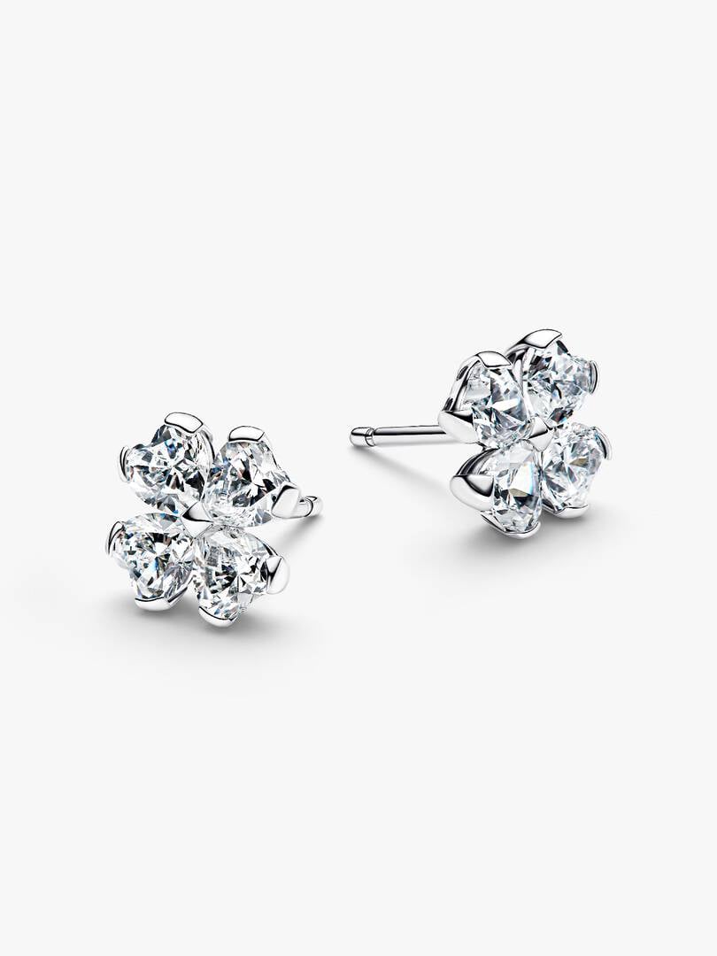 Pair of diamond stud earrings on a white background