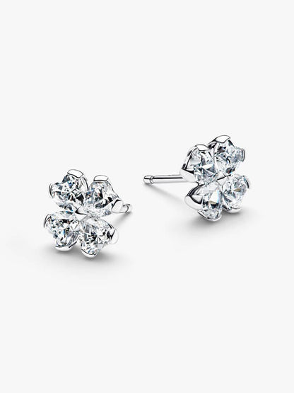 Pair of diamond stud earrings on a white background
