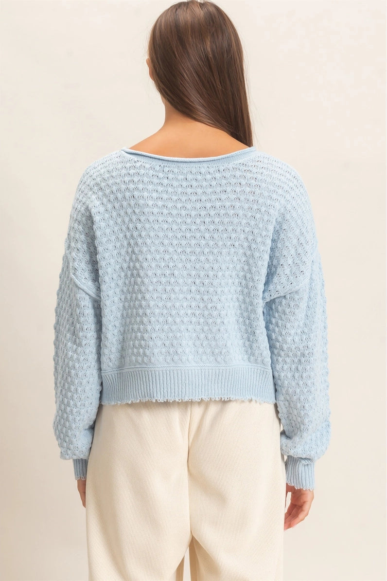 woman wearing blue sweater 