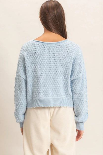 woman wearing blue sweater 
