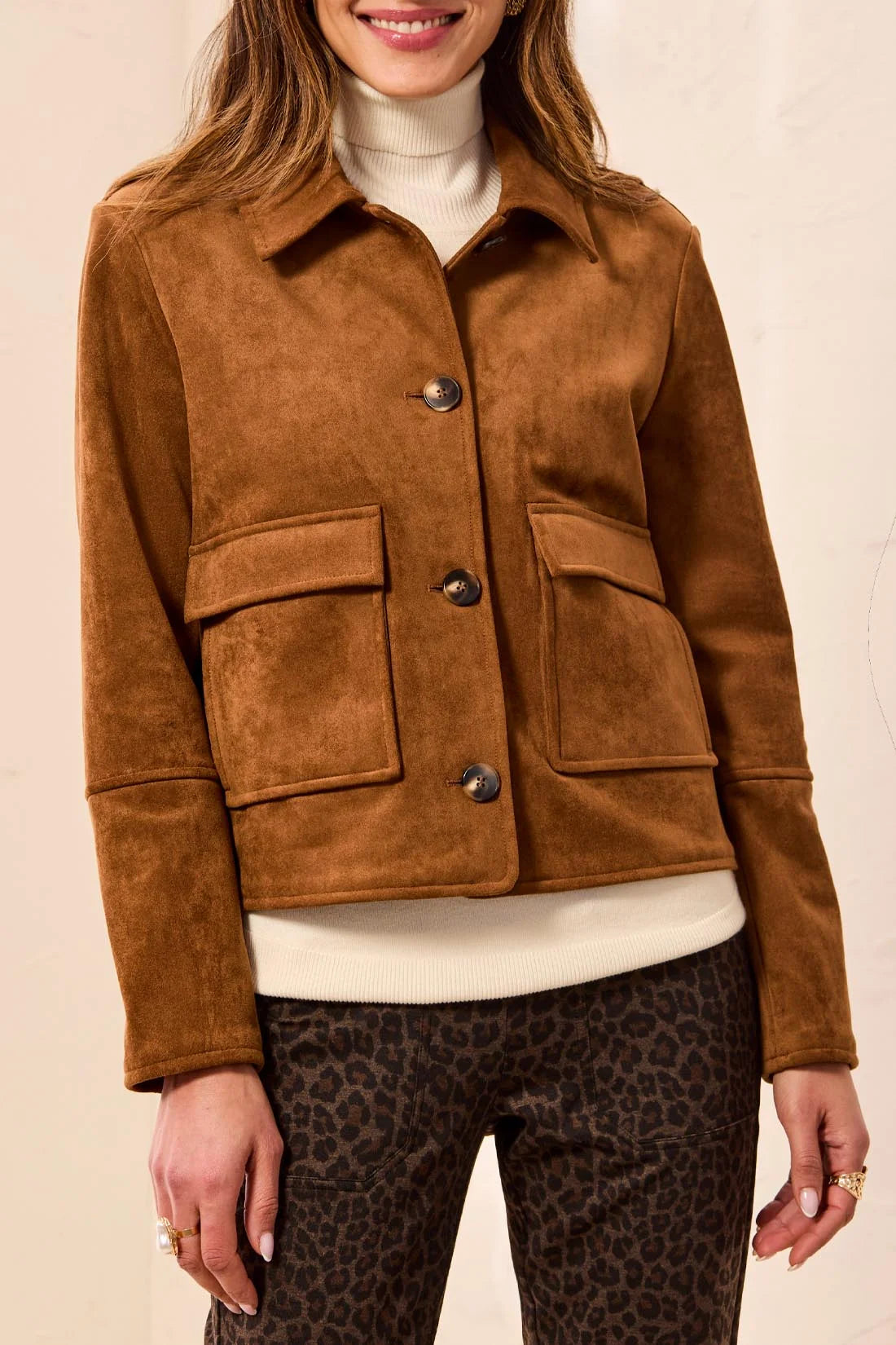 woman wearing brown shacket 