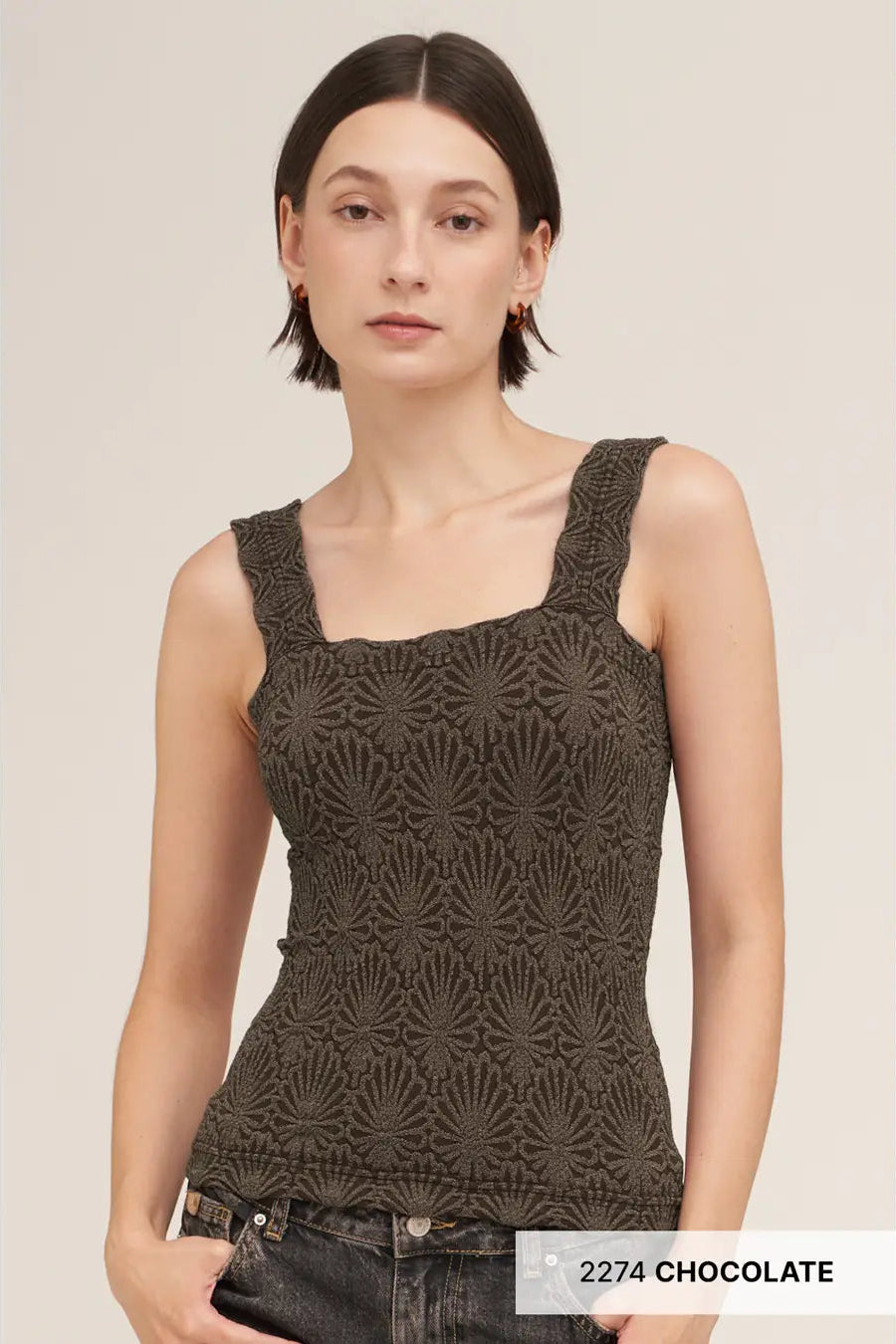 A woman modeling a sleeveless scoop-neck tank top in a dark chocolate brown color with a textured, tonal sunburst pattern. The image has a text overlay at the bottom right that reads '2274 CHOCOLATE'.