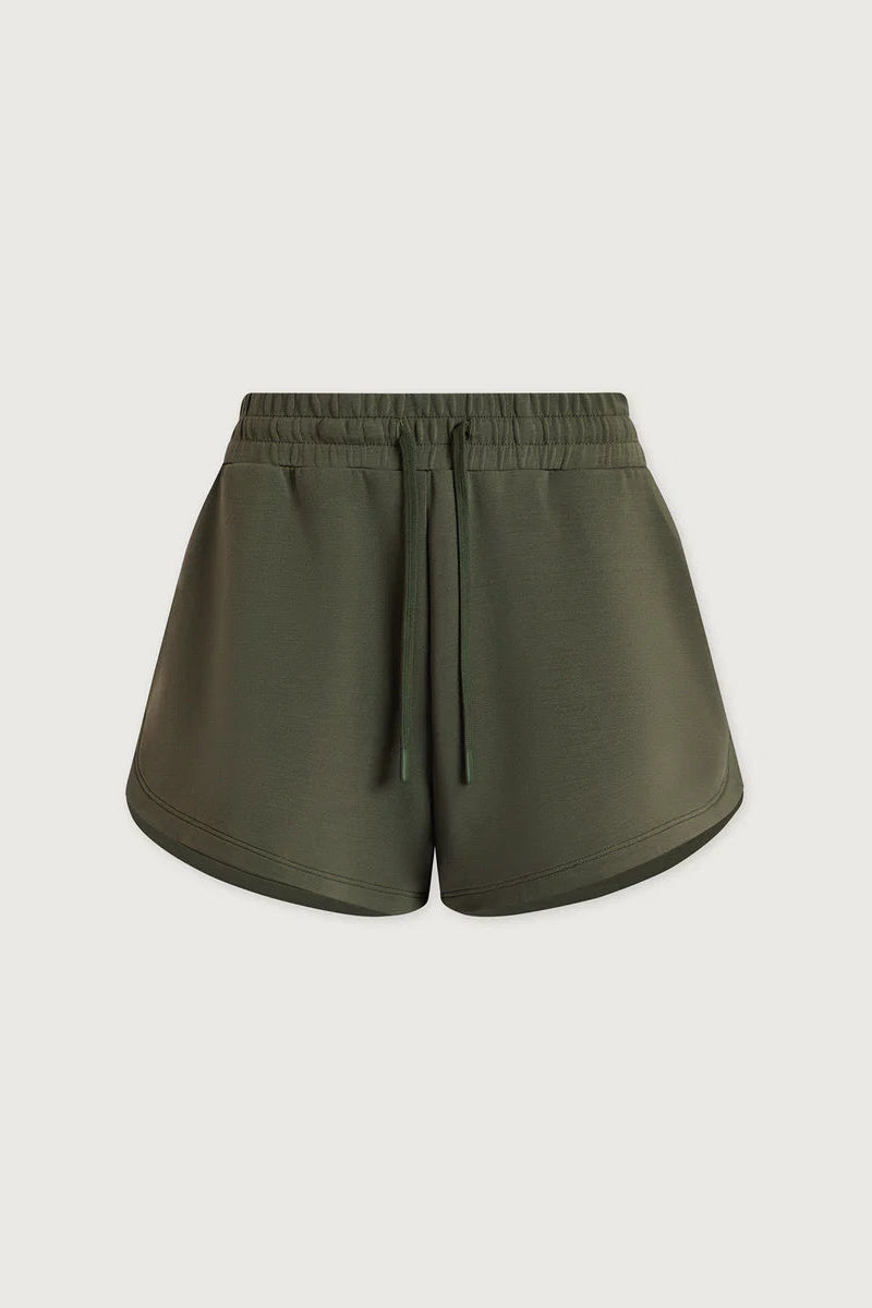 green shorts on white background