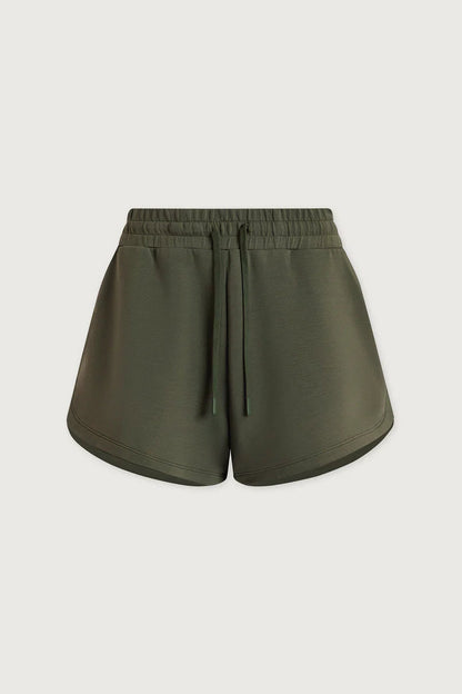 green shorts on white background