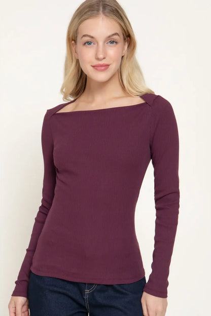 woman in wine colored top