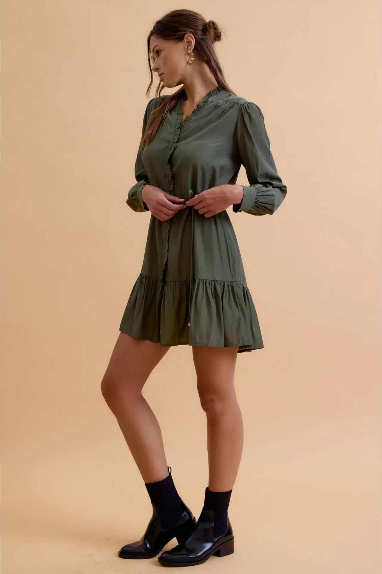 girl in green shirt dress