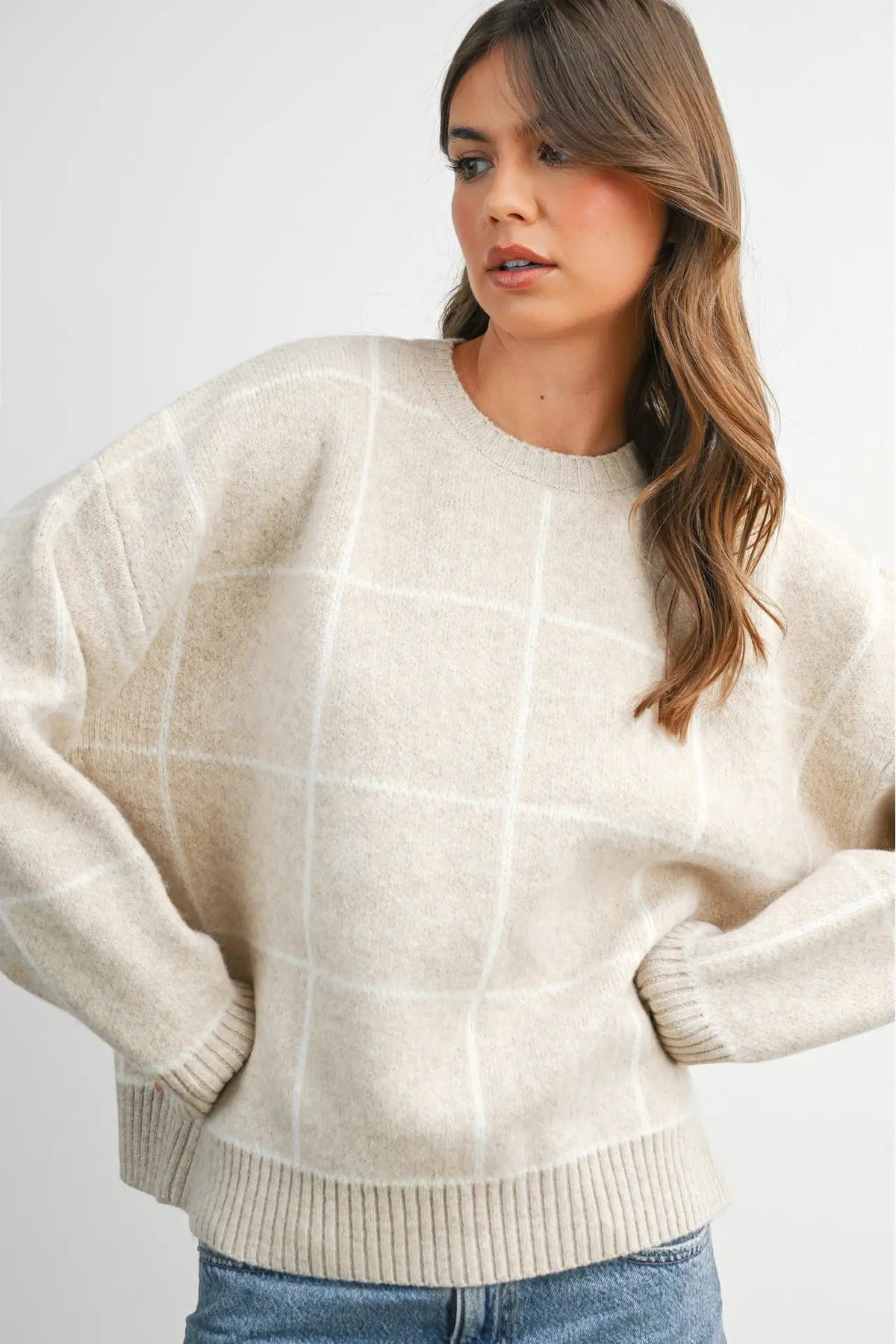 woman in check sweater