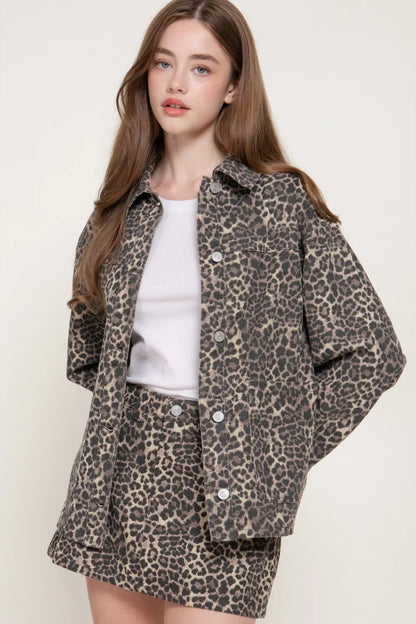 woman in leopard print jacket and skirt 