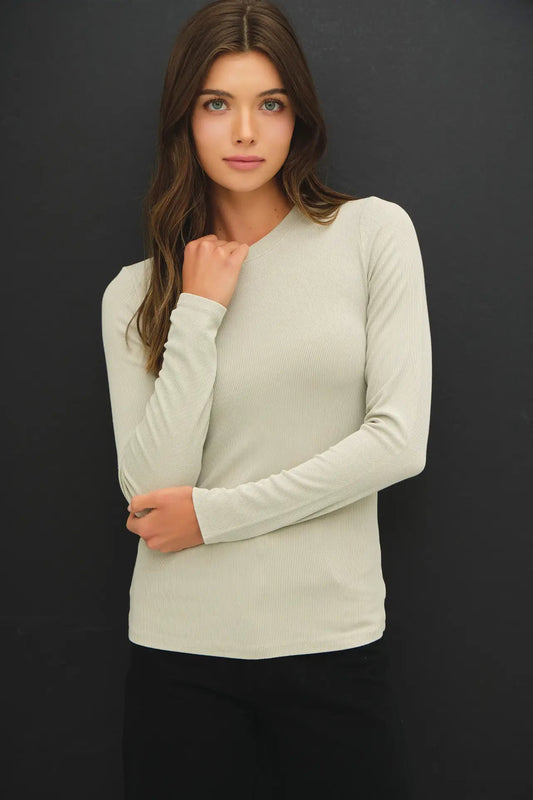 woman in long sleeve top 