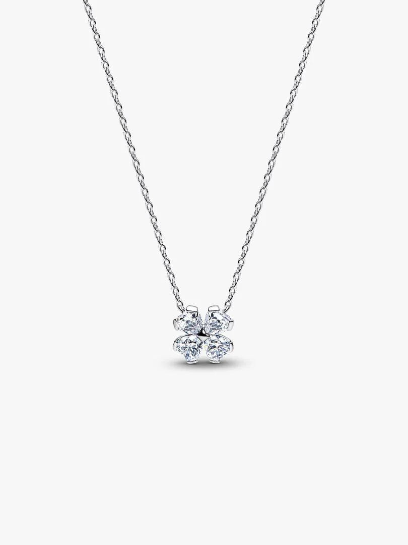 Silver necklace with a small pendant on a white background