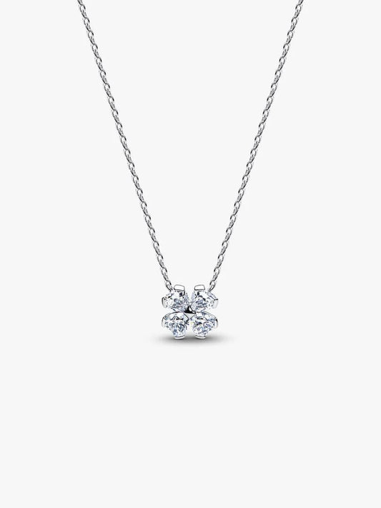 Silver necklace with a small pendant on a white background