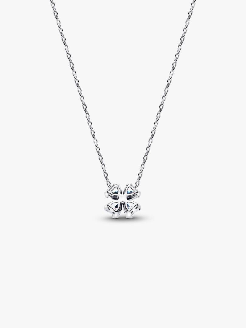 Silver necklace with a clover-shaped pendant on a white background