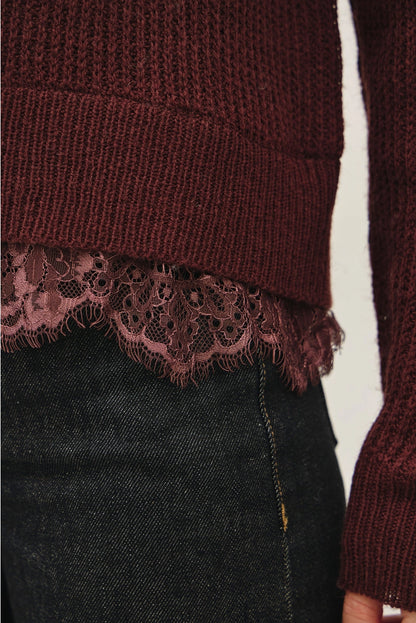 close up of lace trim on sweater