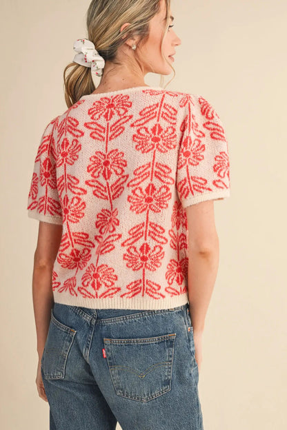 back view of woman in sweater and jeans