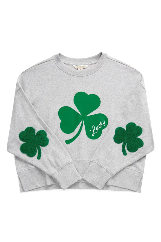 Gray sweatshirt with green shamrock designs and 'Lucky' text on a white background