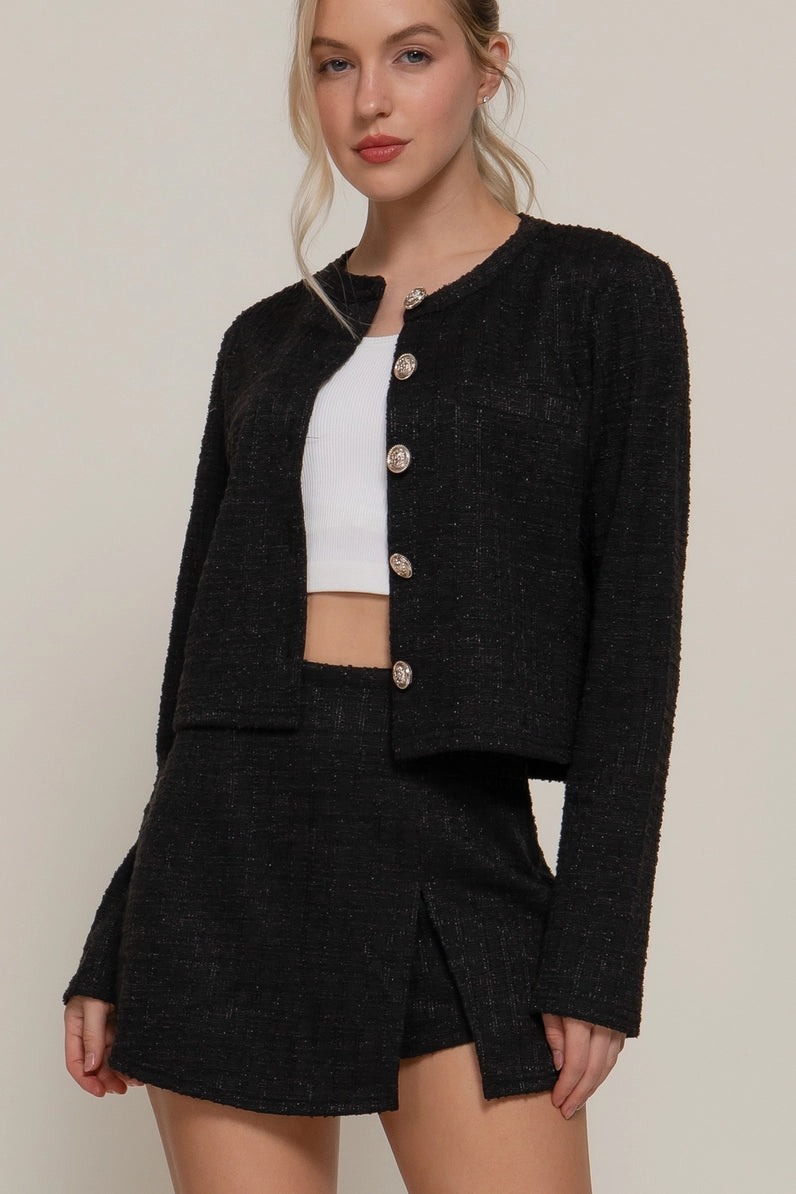 woman in tweed skort 