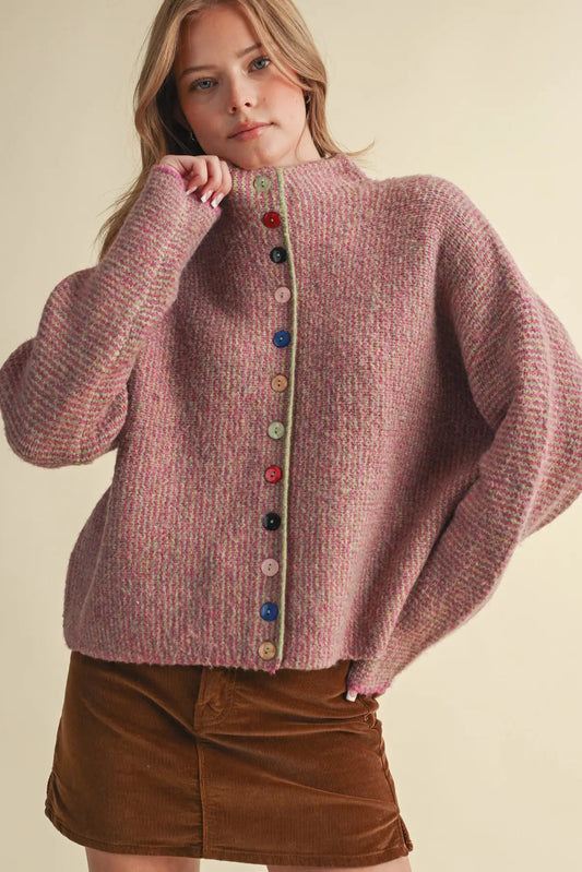 woman in colorful button cardigan and skirt 