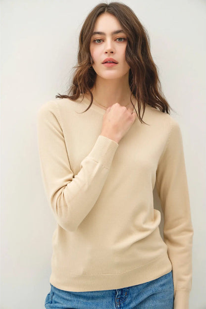 woman wearing sweater with jeans 