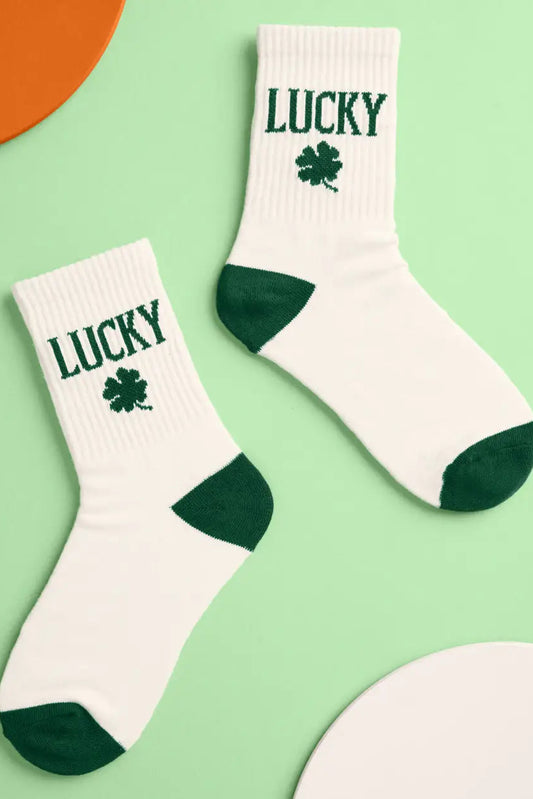 White socks with green accents and 'LUCKY' text on a green background