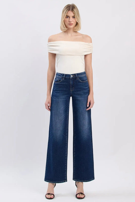 woman in top and jeans