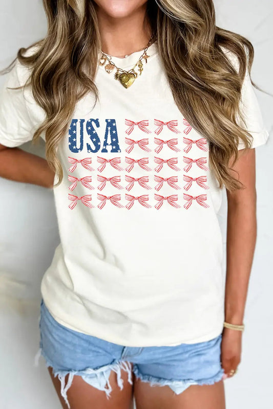 woman wearing usa bow design tee with jean shorts