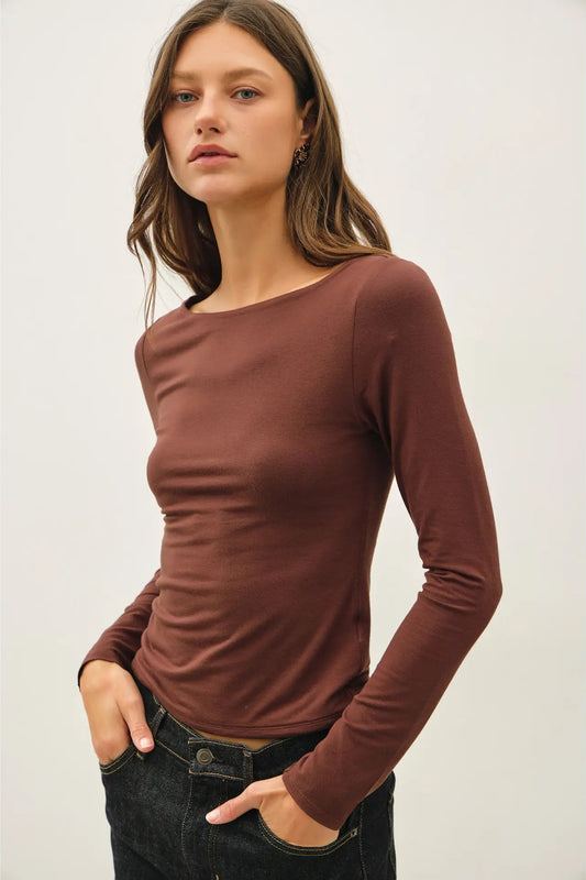 woman in long sleeve top 